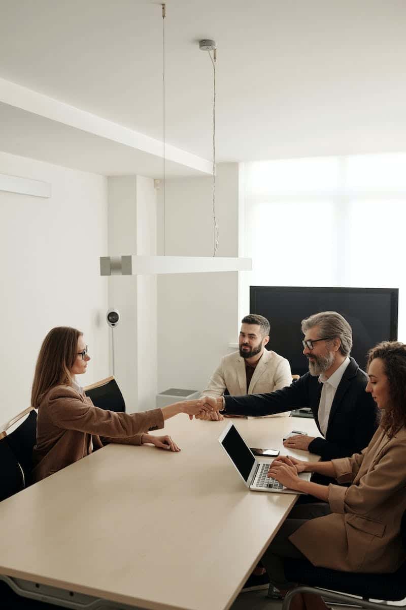Meeting with your Lawyer. Businesspeople purchasing a Business.