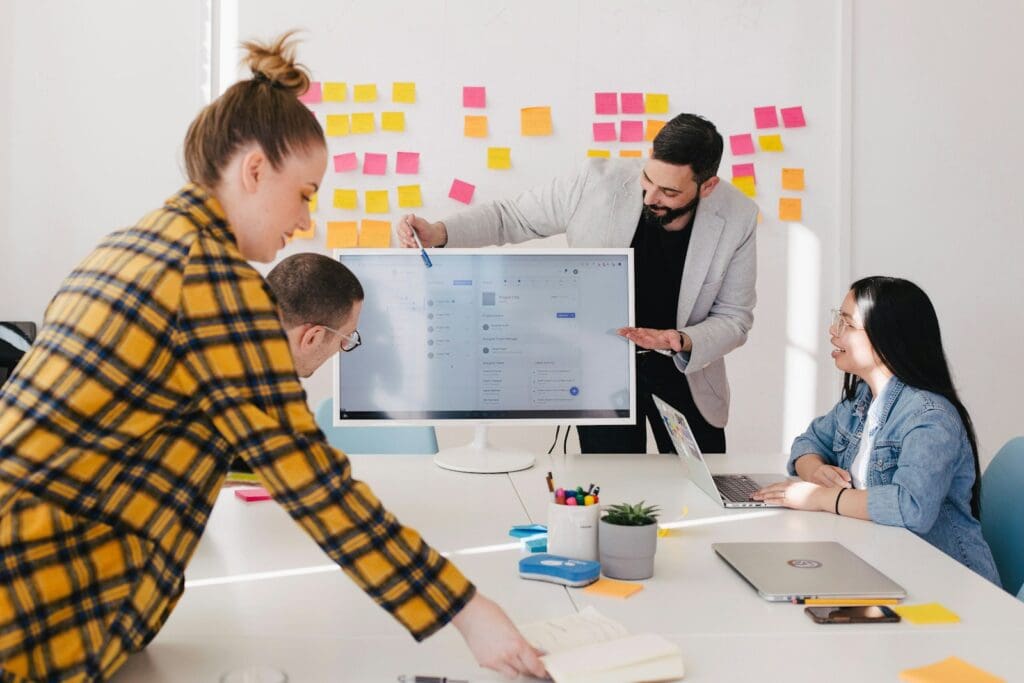 Management Consultants meeting about their business client. How Management Consultancy can benefit your business. External Commercial Manager. Business Management Consultant.