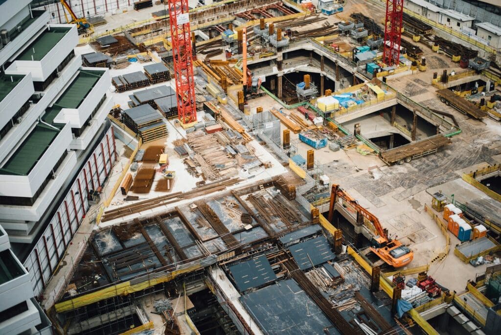Large Business 1 Aerial view of high-rise buildings. Indemnities, Insurances and Limits of Liability in Construction Contracts. Large Business. AS2124-1992. AS2124