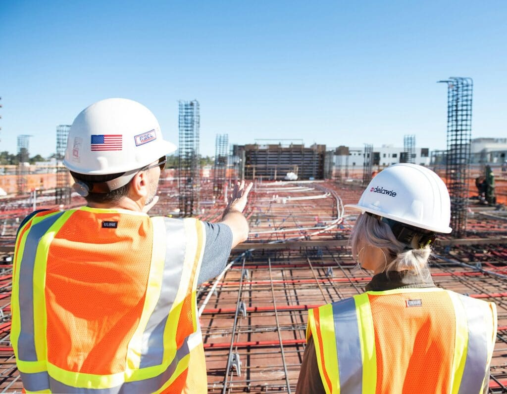 Find Your Trusted Construction Lawyer Brisbane in 2025 2 Construction workers at a building site. Construction Lawyer Brisbane. Construction Lawyers Brisbane. Construction Contract Review. Review of a Construction Contract