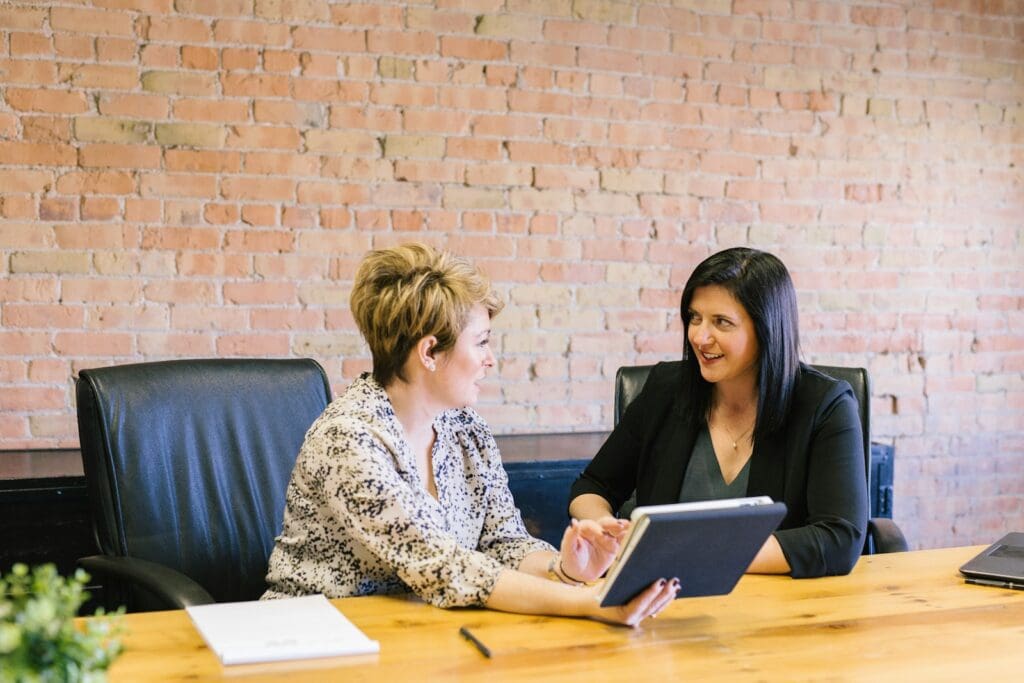 Do You Need Management Consulting for Your Australian Business? 1 Lawyer and Management Consultant and Client sitting discussing business improvement and Legal Services. Management Consulting. What is a Conflict of Interest?