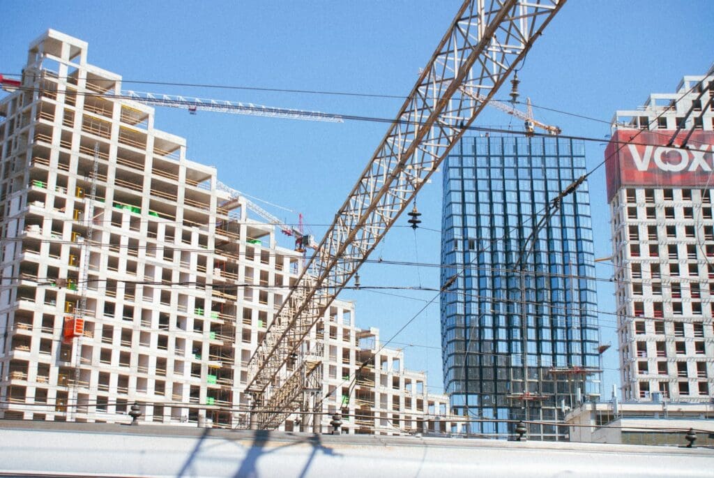 Construction Lawyers | Blaze Business & Legal 10 Construction site with a crane in the foreground. Time, cost and quality. Quality, time and cost. Quality, cost and time. Time, quality and cost. Time, quality, and cost. Construction Lawyers. AS2124-1992. AS2124