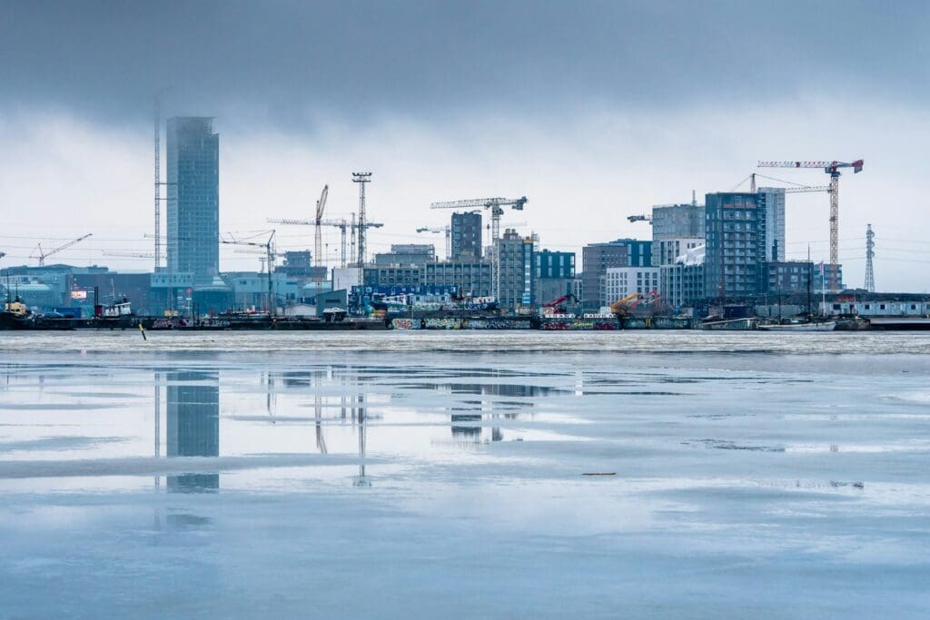 Find Your Trusted Construction Lawyer Brisbane in 2025 3 Large building construction sites after a rainstorm. AS2124-1992. AS2124. Construction Lawyer Brisbane