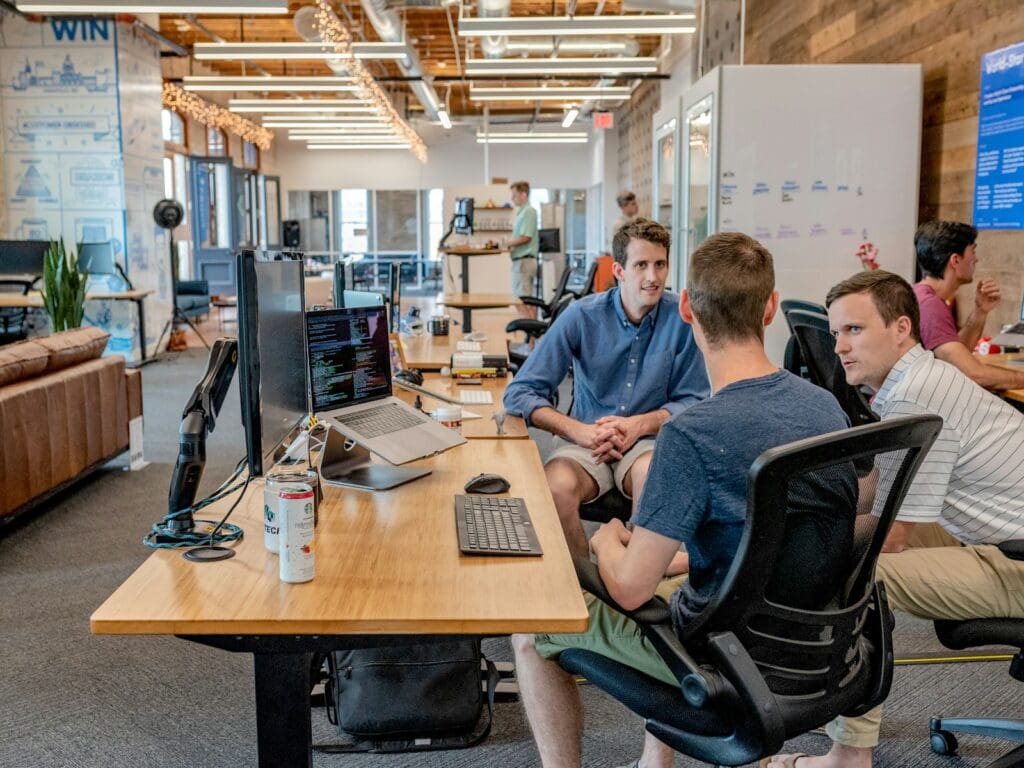 Get Business Management Consulting and Transform Your Company 1 Business Advisor and clients sitting on chair beside tables. What is the process of guiding business strategy using facts? Business Management Consulting. Business Growth Strategist.