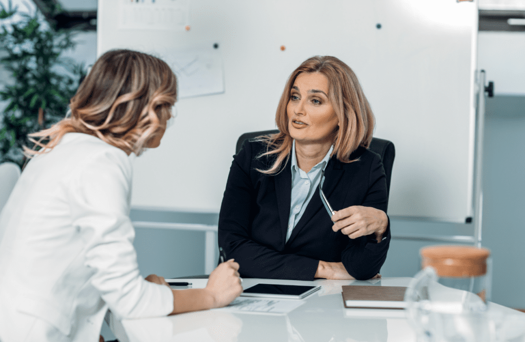 Leveraging Business Advice for Growth and Success (Our 10-point Roadmap in 2025) 5 Business advisor talking with her client in the office. Business Advice