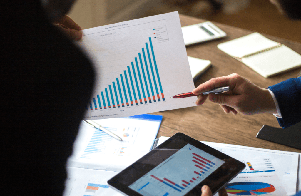 Leveraging Business Advice for Growth and Success (Our 10-point Roadmap in 2025) 12 A close-up shot of a business meeting displays company growth. Business Advice