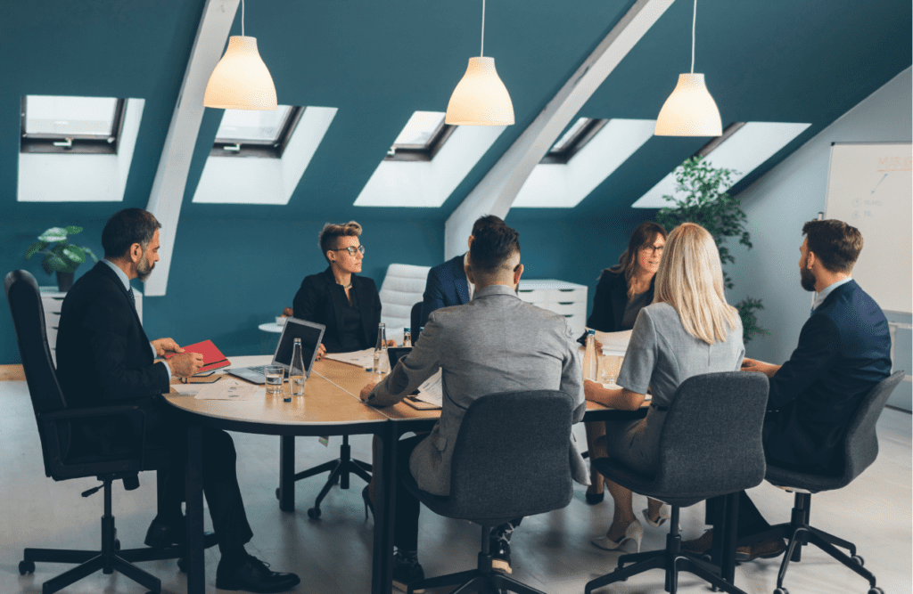 Leveraging Business Advice for Growth and Success (Our 10-point Roadmap in 2025) 11 Business professionals having a meeting in a conference room. Business Advice