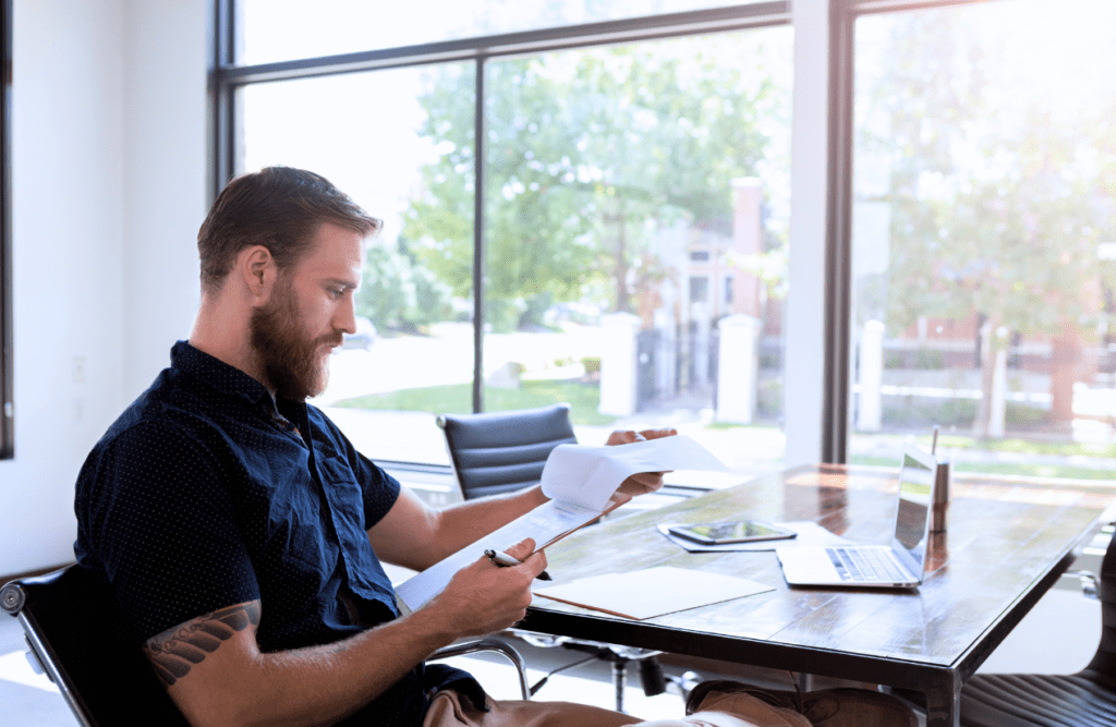 How our Contract Review Lawyer can save you money 5 Businessman scanning a contract. How to Review a Contract. Contract Review Lawyer