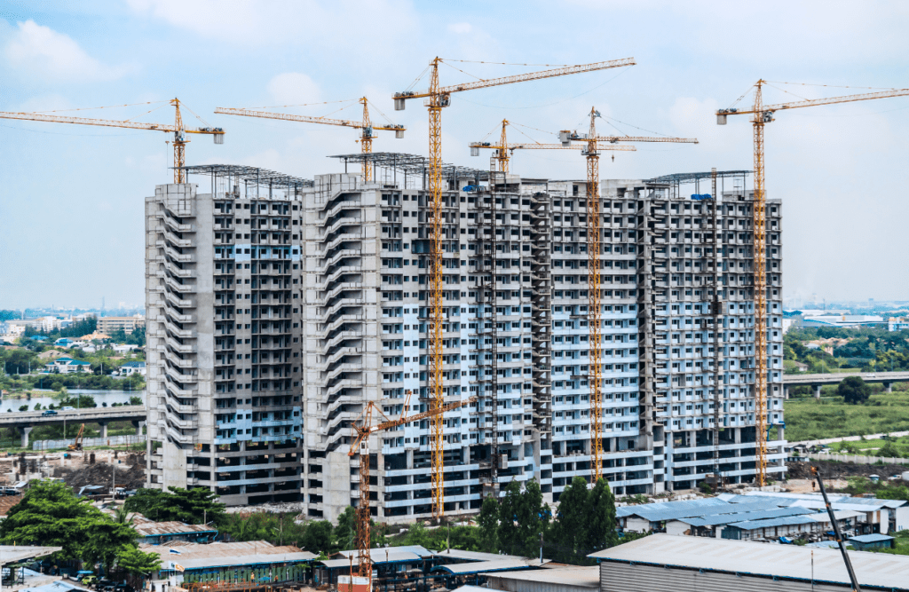 Your Design and Construct Contract Explained – How the D&C Contract Model Works in Australia 1 A construction site with a building in progress. Design and Construction Contracts