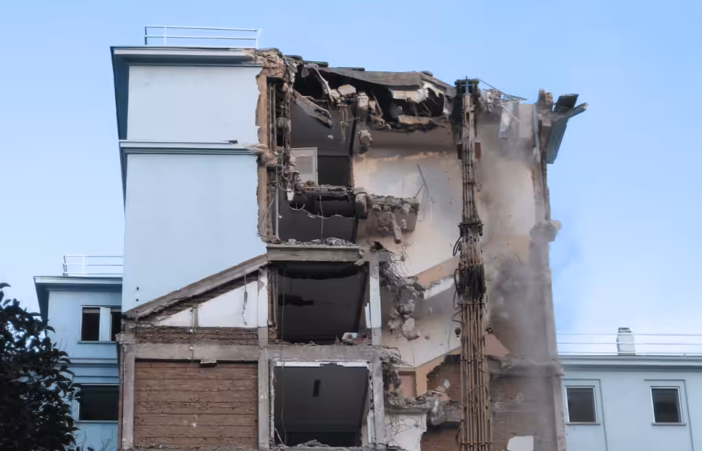 Partially demolished multi-story building. DLP Meaning