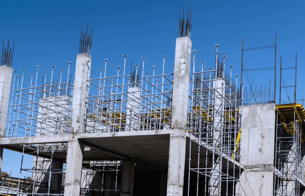 DLP Meaning – What is the Defects Liability Period in Construction? 8 Metal concrete structures of a building under construction. DLP Meaning