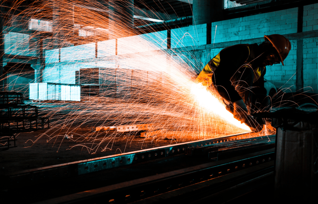 DLP Meaning – What is the Defects Liability Period in Construction? 17 Construction worker welding a metal. DLP Meaning