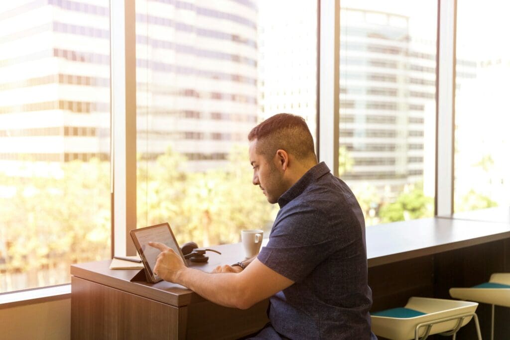 How our Contract Review Lawyer can save you money 11 Businessman using laptop computer. Leveraging business advice for growth. Contract Review Lawyer