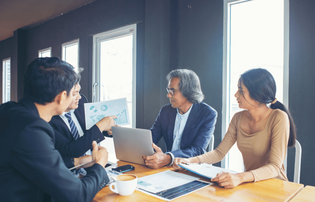 Management Consulting – A Straightforward Guide for Australian Business Owners 13 Consultant and business professionals engaged in a meeting. Management Consulting