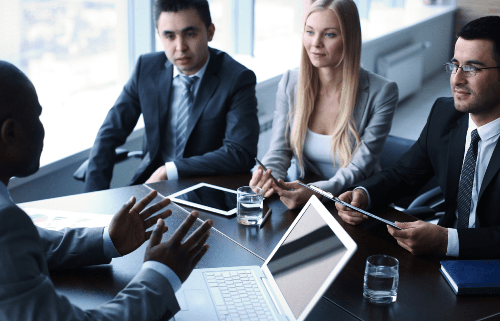 What is the Management Consulting Industry – A Practical Guide for Australian Businesses 5 Management Consultant talking with his clients. Managment Consulting Industry