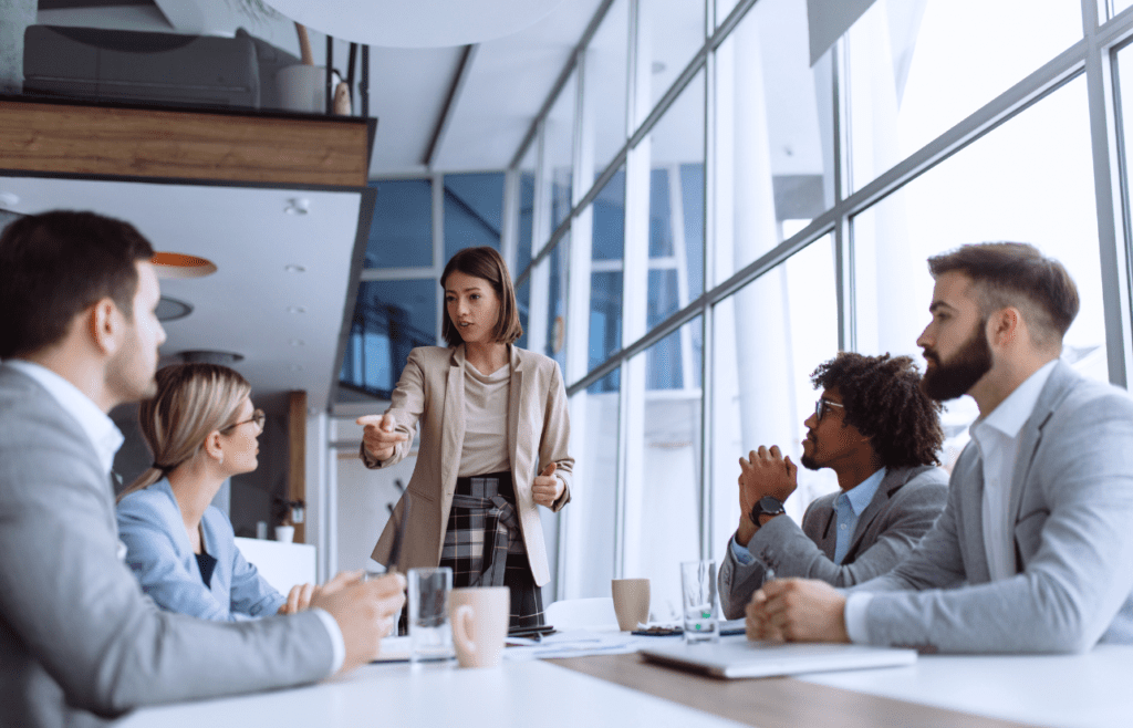 What is the Management Consulting Industry – A Practical Guide for Australian Businesses 17 a woman standing in front of a group of people