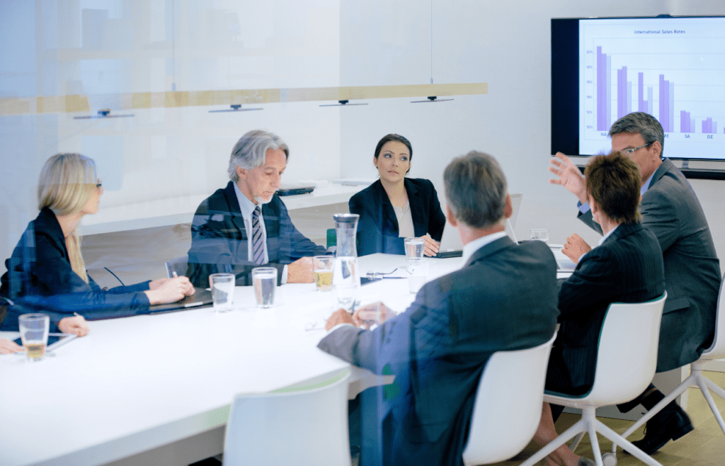 Management Consulting – A Straightforward Guide for Australian Business Owners 17 Business team gathered in the office. Management Consulting