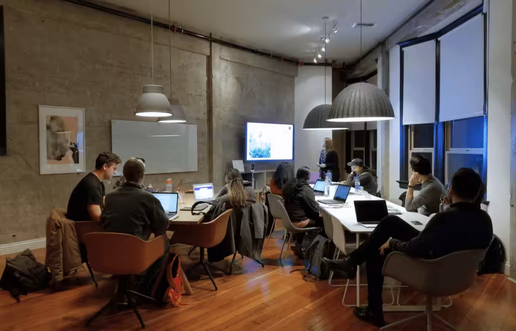 Business people gathered in an office. Management Consulting and Strategy Consulting. Consultant Brisbane
