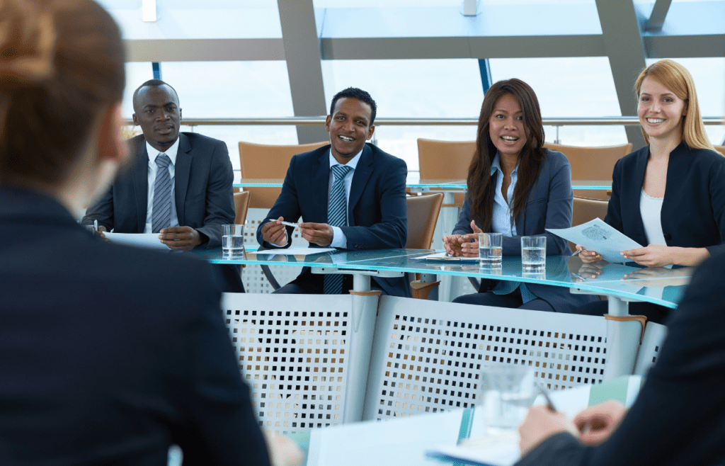 Discover Expert Management Consulting and Strategy Consulting 6 Business team on a roundtable discussion. Management Consulting and Strategy Consulting