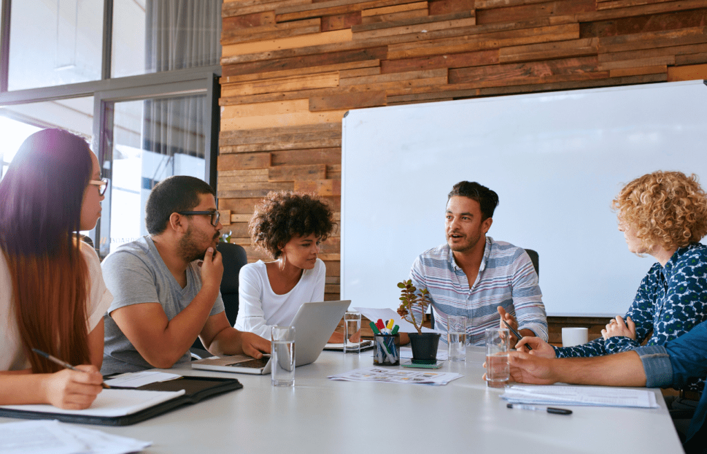 What is the Management Consulting Industry – A Practical Guide for Australian Businesses 1 Group of business professionals having a meeting. Managment Consulting Industry. Management Consulting Professional