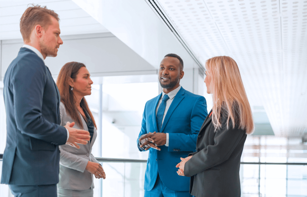 Management Consulting – A Straightforward Guide for Australian Business Owners 11 Three business professionals engaged in a conversation. Management Consulting. Management Consulting Professionals