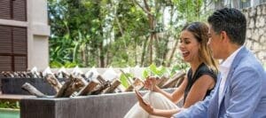 Employer and potential employee sitting on a bench. Employment Contract Review