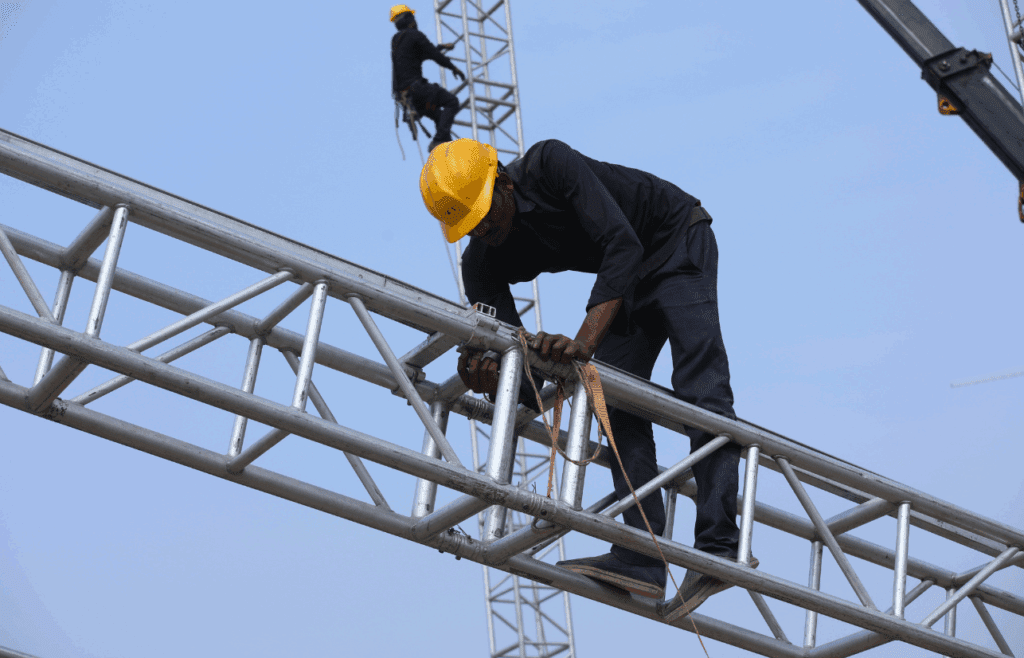Man welding a metal structure. Contsruction and Contracting