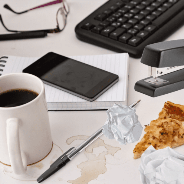 Messy desk from too many business challenges Blaze Business Legal