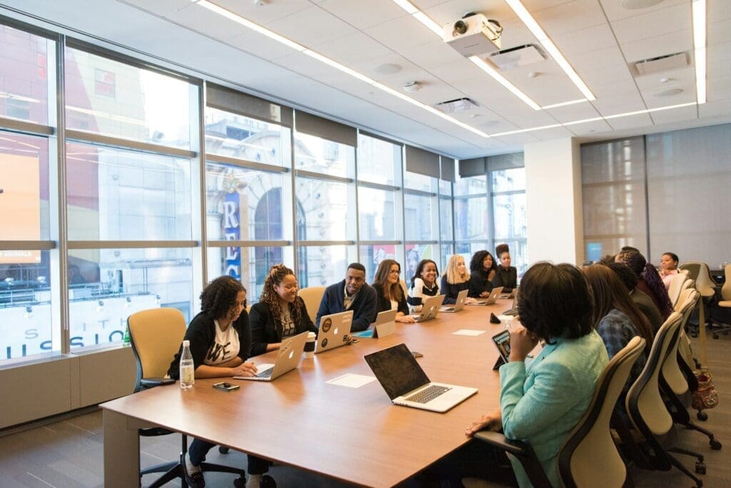 Board meeting discussing governance services provision
