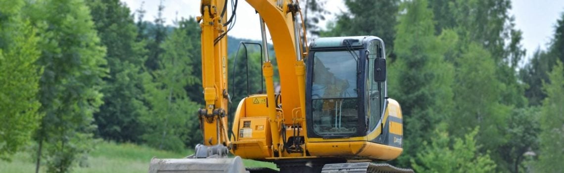 Yellow Excavator. Construction Equipment.