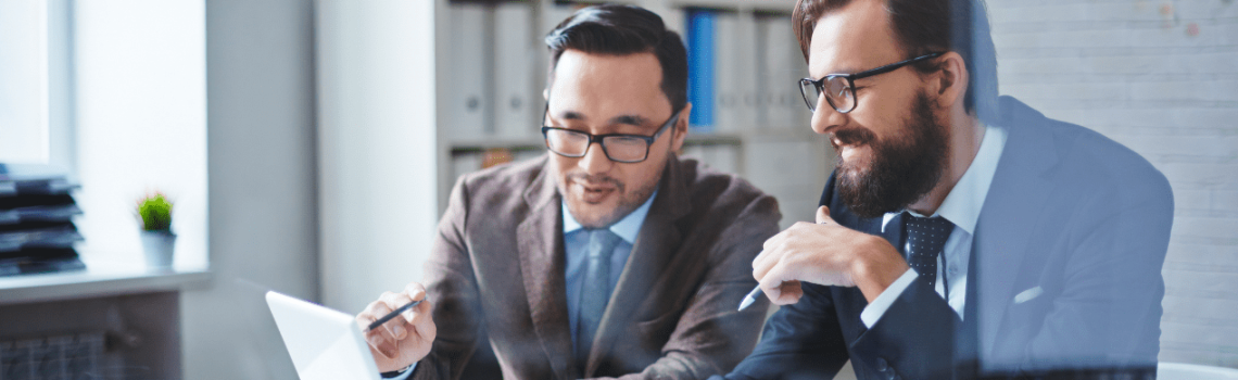 A businessman and a growth consultant discussing on the growth progress of the business. Business Growth Consultant.