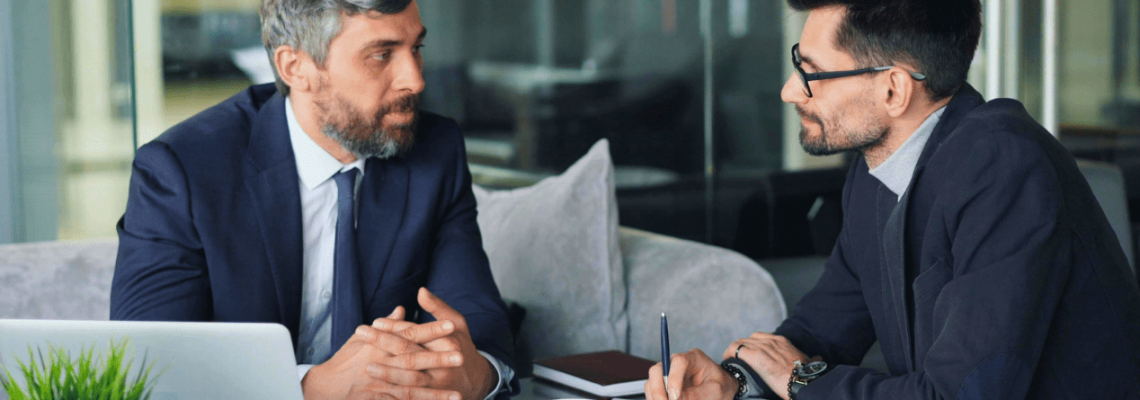 Two business professionals having a discussion. Business Advice. Contract Review Lawyer. Management Consulting Industry