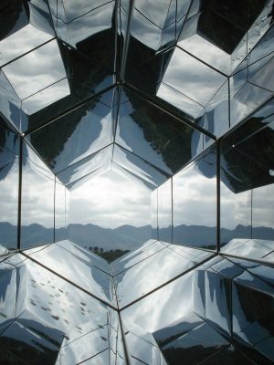 The reflection of the sky in the glass of a building. External Commercial Manager. Information Barriers in Australia. Terms and Conditions
