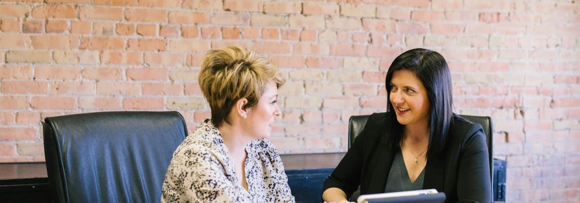 Lawyer and Management Consultant and Client sitting discussing business improvement and Legal Services. Management Consulting. What is a Conflict of Interest? Lawyer and Management Consultant and Client sitting discussing business improvement and Legal Services. Management Consulting. What is a Conflict of Interest?
